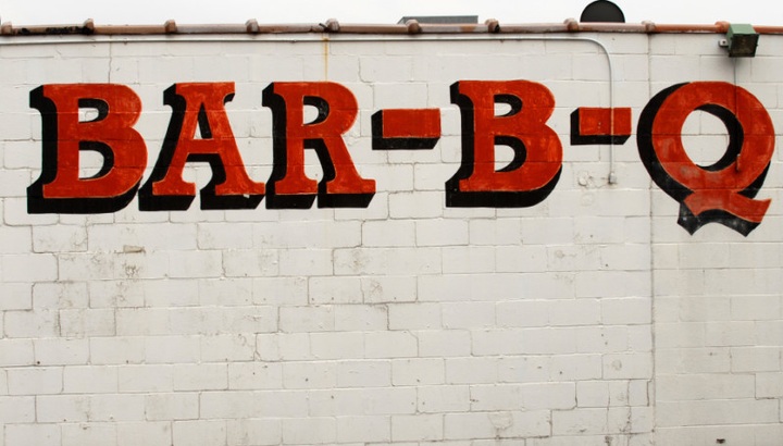 Bar-B-Q sign on the side of a building